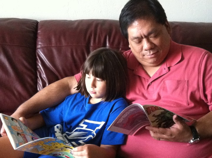 Reading together on the sofa