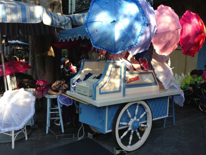 The parasol cart standing unobtrusively in New Orleans Square