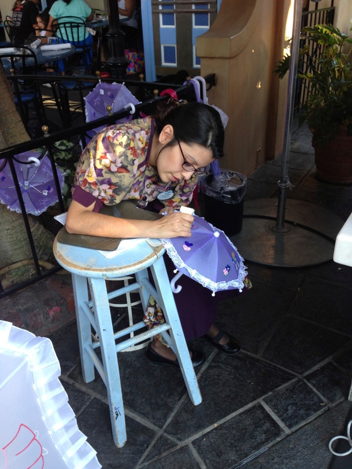 Working hard on making the perfect parasol