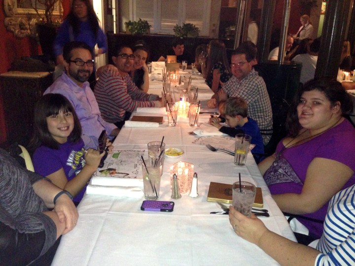 Friends enjoying a night out together at a good restaurant.