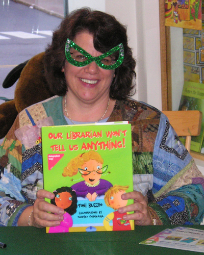 Toni showcasing one of her previous books