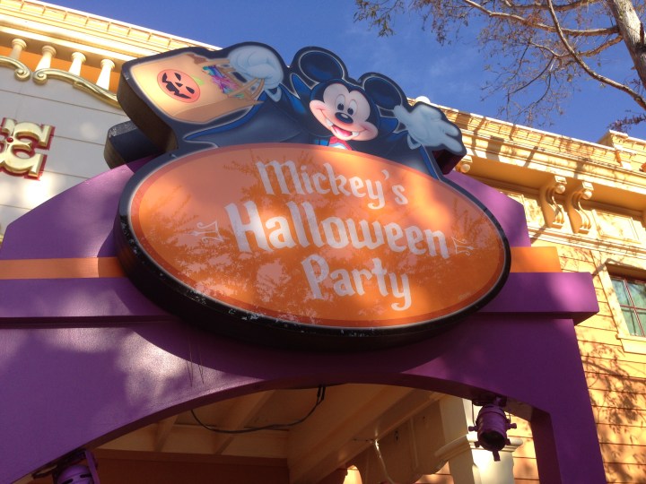 Treat station signs can be found all over the park