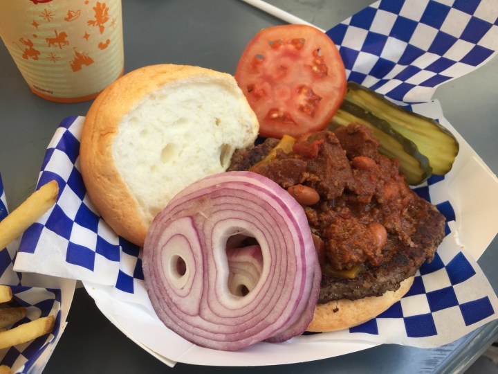 Chili cheeseburger on a gluten-free bun