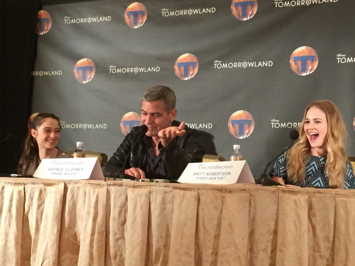A lighter moment with (L to R) Raffey Cassidy, George Clooney, and Britt Robertson