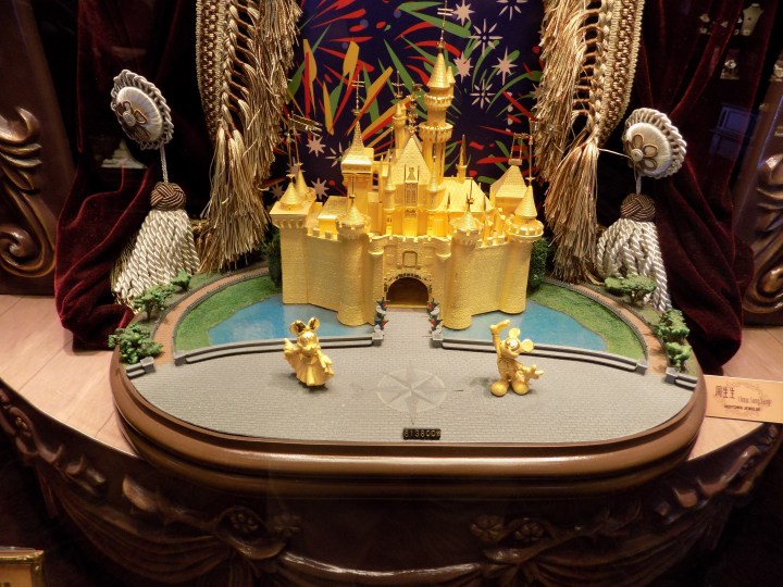 Beautiful gold castle with gold Mickey and Minnie will only set you back about $80,000 USD