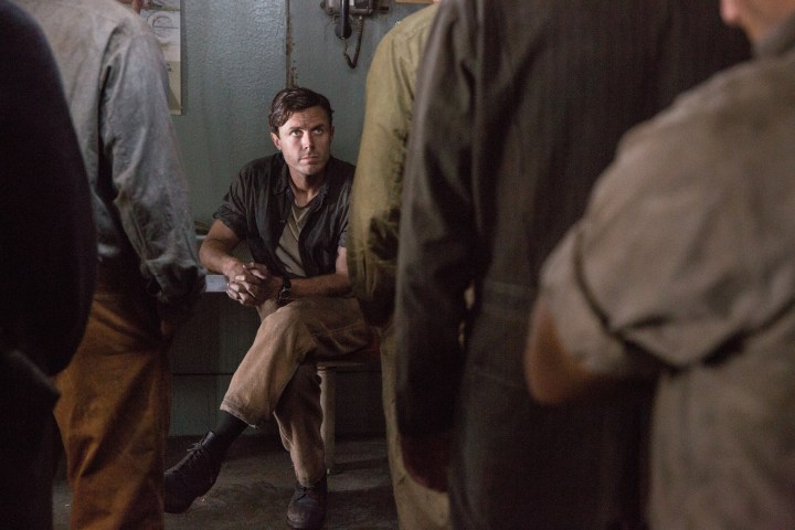 Ray Sybert (Casey Affleck) and fellow crew members struggle to keep their ship, the SS Pendleton, from sinking in Disney's THE FINEST HOURS, the heroic action-thriller based on the extraordinary true story of the most daring rescue mission in the history of the Coast Guard.