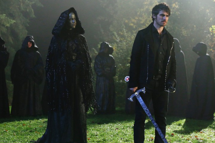 ONCE UPON A TIME - "Swan Song" - The dark siege of Storybrooke is underway as all of the resurrected Dark Ones target a living soul for sacrifice so that they can return to the realm of the living. With doom imminent, Gold advises Mary Margaret, David and the rest of the heroes to spend their last fleeting moments enjoying the company of their loved ones. Emma, however, refuses to give up, knowing that she is responsible for righting all the poor choices she made as Dark One - there's only one problem, Dark Hook. When they face-off with the fate of Storybrooke at stake, Hook's actions will devastate Emma in a way no one saw coming. In a Fairy Tale Land flashback, the Evil Queen tests Hook's mettle by forcing him to confront a demon from his past before contracting him to dispatch one from hers, on the winter finale of "Once Upon a Time," SUNDAY, DECEMBER 6 (8:00-9:00 p.m., EST) on the ABC Television Network. (ABC/Jack Rowand) CAROLINE FORD, COLIN O'DONOGHUE