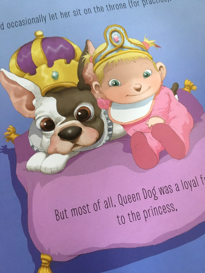 Queen Dog loves the newest princess to the land
